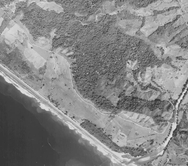 1972 black-and-white aerial — the cattle-ranch baseline. Pair with today aerial for before/after.